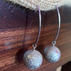 Silver tone earrings